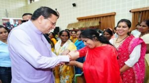 cm-pushkar-singh-dhami-rakhi.jpg
