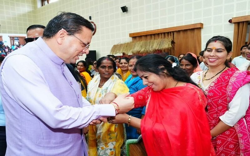 cm-pushkar-singh-dhami-rakhi.jpg